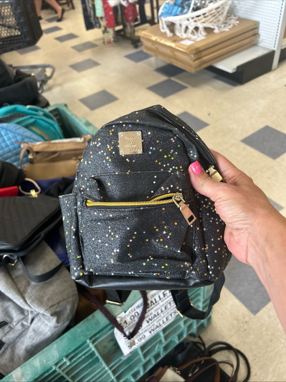 Michael Kors Black Mini Backpack with Multicolor Star Print and Gold Hardware